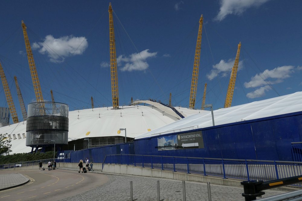   The O2 dome at Greenwich taken at 24mm. Note what appears to be a fin, centre top. Below: At 360mm all is clear — the hardy tourists, with clearly visible harnesses, making their way to the summit  