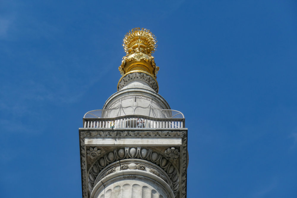   Even the 360mm zoom of the C-Lux cannot capture the fiery ball atop The Monument — but it does show one brave soul who has climbed up from ground level. So a bit of cropping is necessary to get the full fiery glory of he golden ball. It