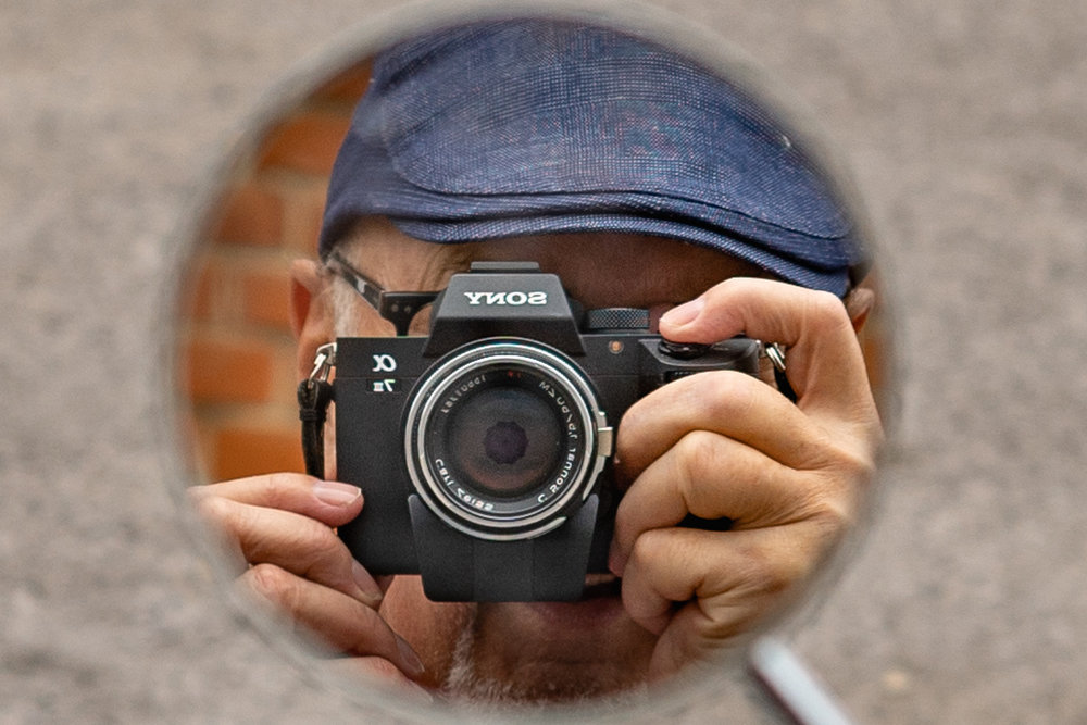 A modest photographer, with a great deal to be modest about