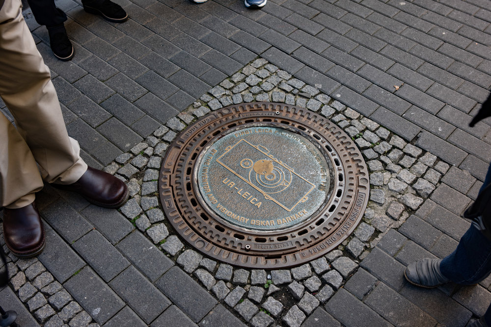 This iron cover, made from local Wetzlar iron, sits in the Eisenmarkt (iron market) to mark the spot from where Oskar Barnack took the Ur-Leica picture
