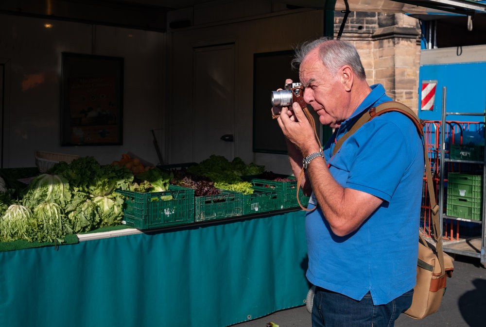 British Leica enthusiast, Keith Walker, keeps an eye on the fruit and veg at the Marburg Cathedral market