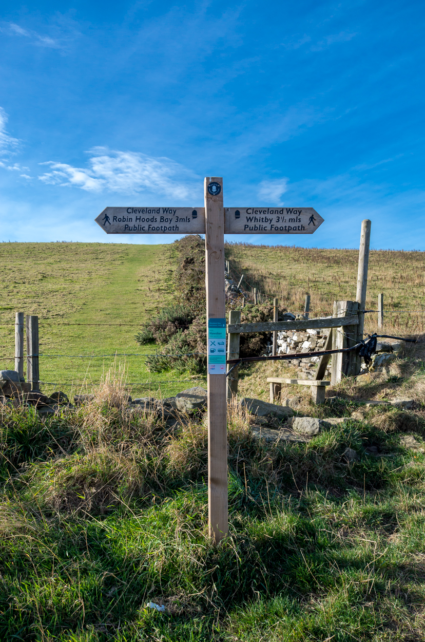 A way marker exactly halfway between Robin Hoods Bay and Whitby