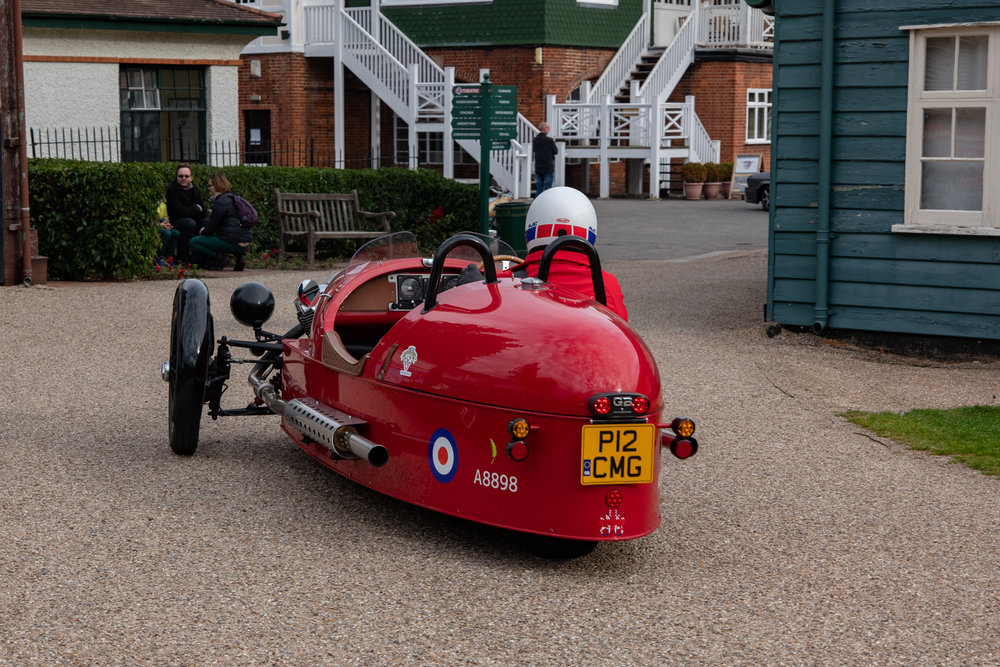 Auf wiedersehen, pet Moggie: This wonderfully preserved Morgan three wheeler sets off for home from the Brooklands classic car event last weekend