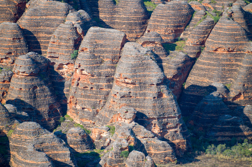 The banded, “beehive” sandstone formations of the Purnululu National Park. Leica TL and 55-135mm lens.