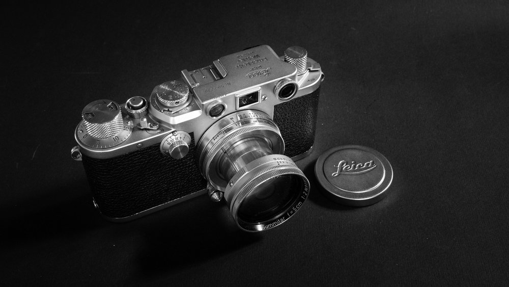 Rangefinder technology was not new in the early 1930s when Leica introduced a two-window system — one for framing the shot, one for setting focus. The M3 brought a single window, a combined rangefinder and viewfinder. It was the “Messsucher” which gave its initial to the continuing brand image. This IIIf is one of the later pre-M models. Image Claus Sassenberg.