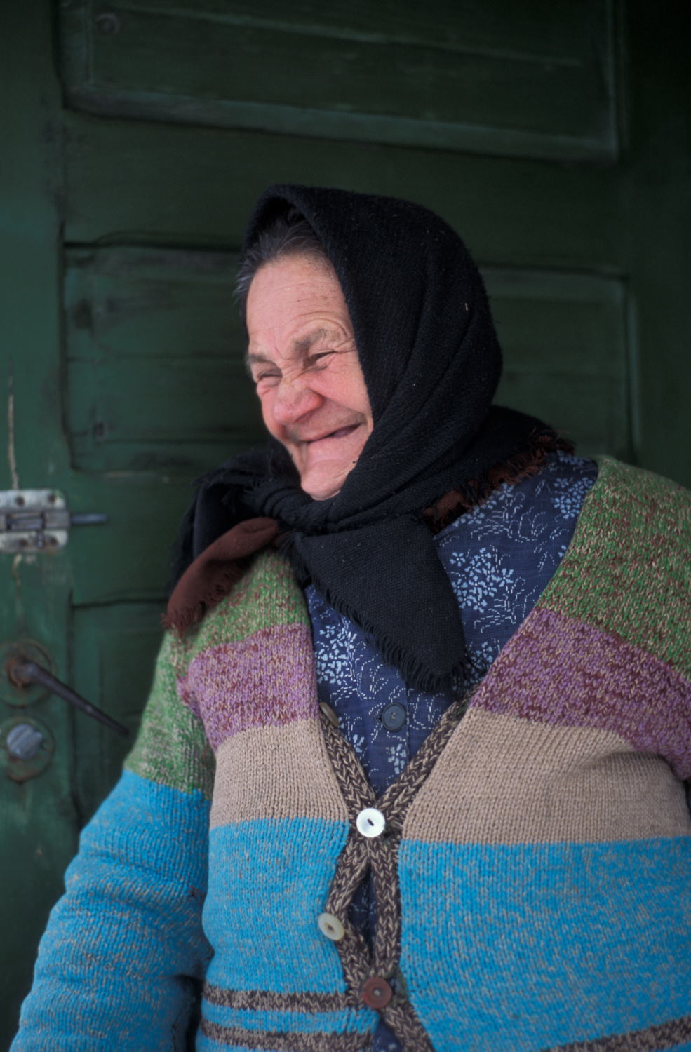 An old lady at her house door in the Hungarian minority area of Transylvania (Leica M6 and 50mm f/2 Summicron)