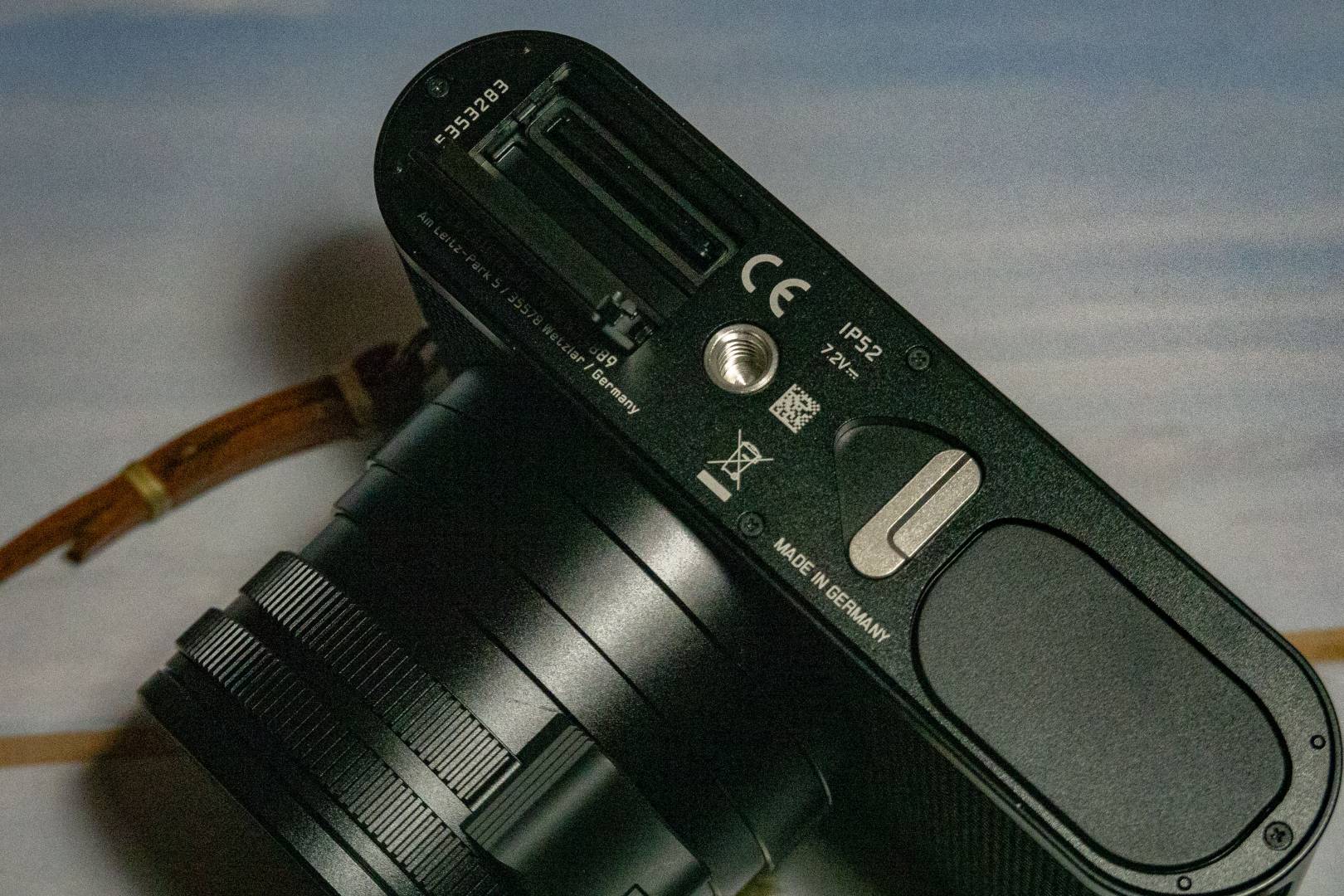 A curious layout: The SD slot sits behind a sliding door on the opposite side of the camera to the pop-out SL battery