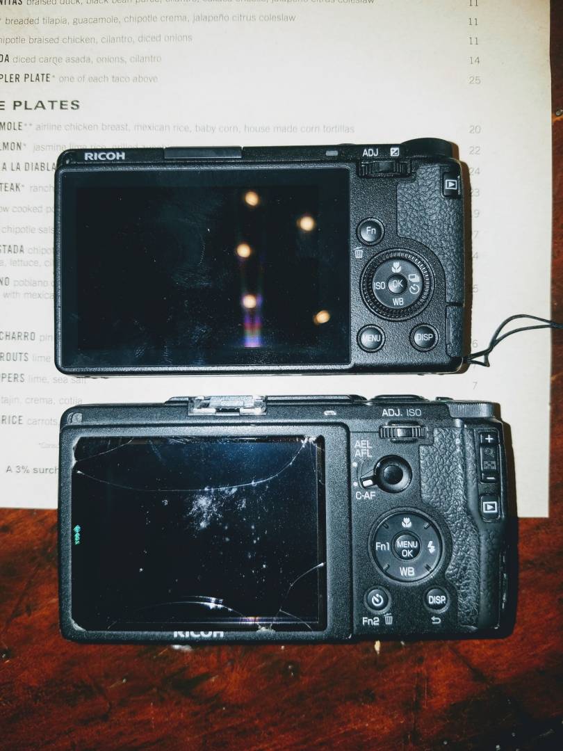 Erics worse-for-wear GRII compared with the ultra-clean (but smaller) body of the new Mk.III. Eric finds the new camera more fiddly. I welcome the absence of the old exposure rocker switch