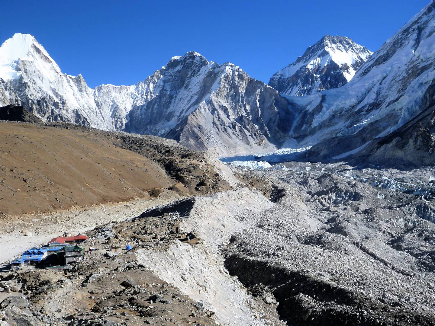 A big mountain and a small sensor camera. Approaching the lodges at Gorak Shep (left front), the site of the Swiss 1952 base camp. The 1953 British and present day base camps are at the base of the glacier (centre of image). The face of Everest as seen from base camp in Nepal has an area a million trillion times greater than the size of the little 1/2.3 sensor in the Sony DSC W350. But the tiny Sony did a good job capturing this image.