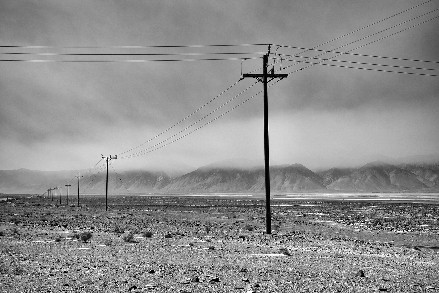 Arid valley with wildfire smoke over the distant mountains, Owens Valley, Eastern Sierras
