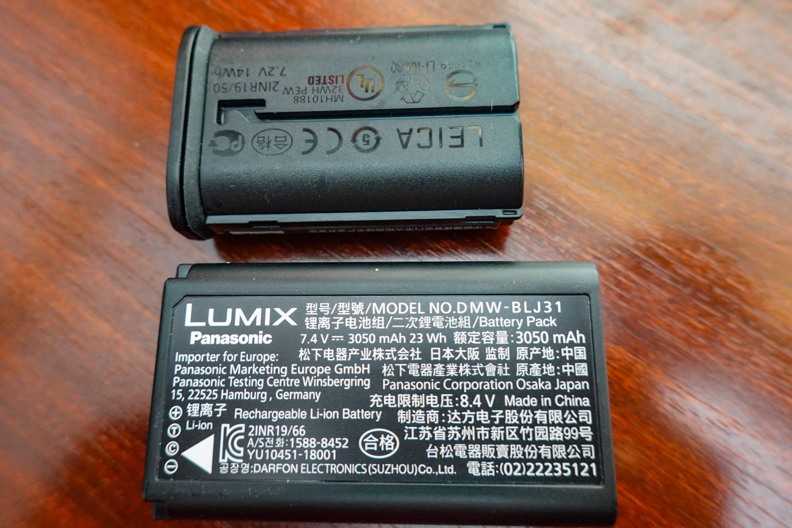The Panasonic S1 battery (bottom) is huge and provides 3050 mAh. The Leica SL/Q2 battery (above) has a rating of only 1860 mAh. If the Panasonic can be charged by USB, so can the Leicas.