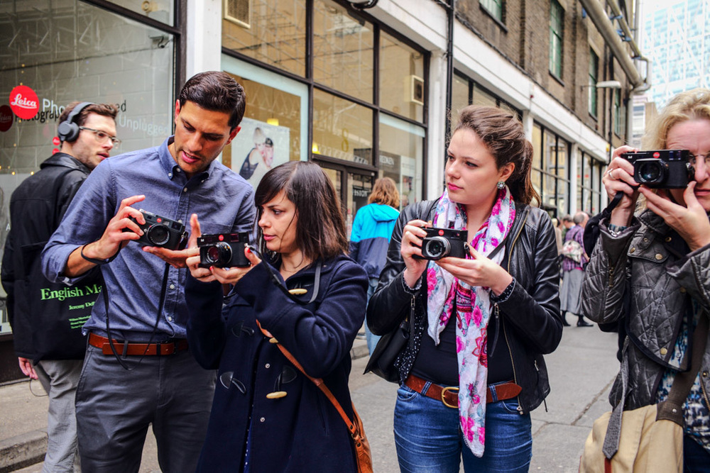Leica M240 cameras on demonstration at a Leica pop-up store in London's Brick Lane in November, 2014. Leica Ambassador Robin Sinha on the left.