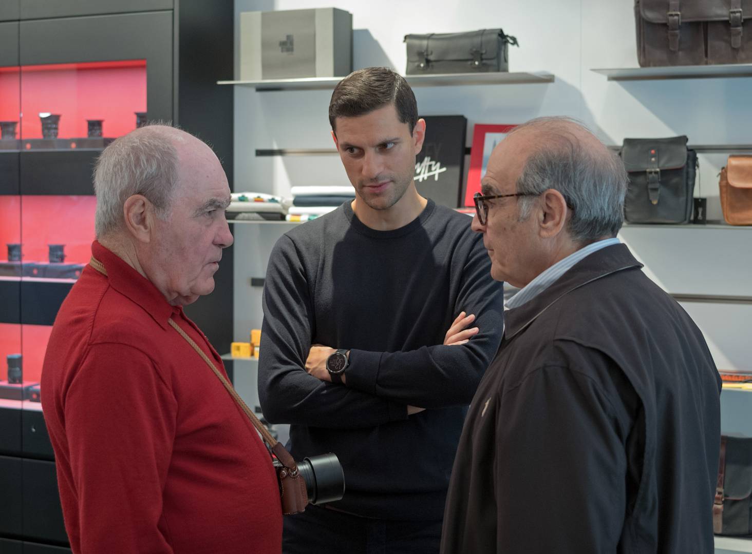 Lional Squire, ARPS, chatting with David Suchet and Robin Sinha of Leica