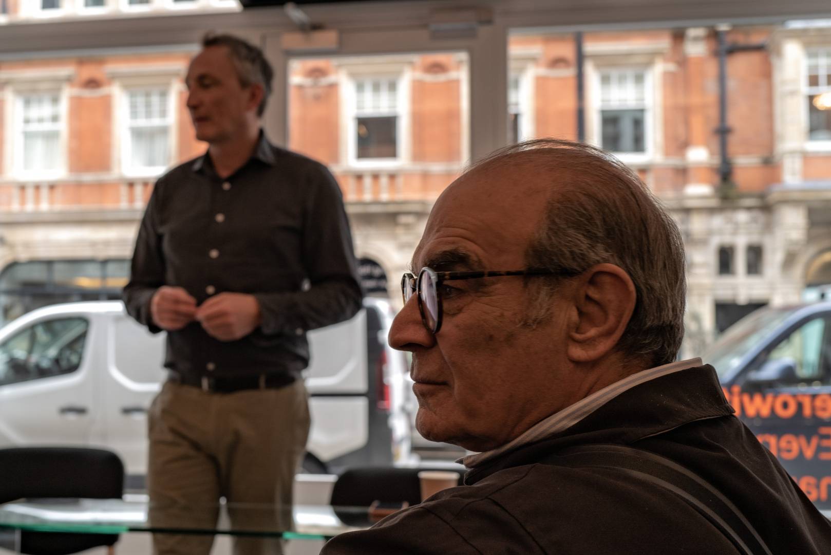 Leica Society president, actor David Suchet - himself a keen photgrapher - looks on as Leica UK managing director, Jason Heward gives visitors a rundown on the latest developments in the company