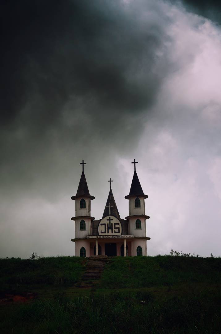 A church against a moody sky I stopped to photograph in Pynursla on the way to Cherrapunjee