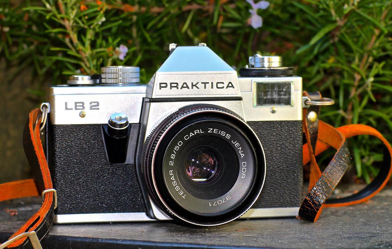 The Praktica had a built-in ‘un-coupled’ light meter – the big window on the camera’s left side. It showed – in bright light anyway, with a pointer needle – which combinations of shutter speed and aperture would give the right exposure, depending on the sensitivity of the film you were using . And you set those suggested choices on the shutter speed dial on the top-plate and on the  aperture ring of the lens.