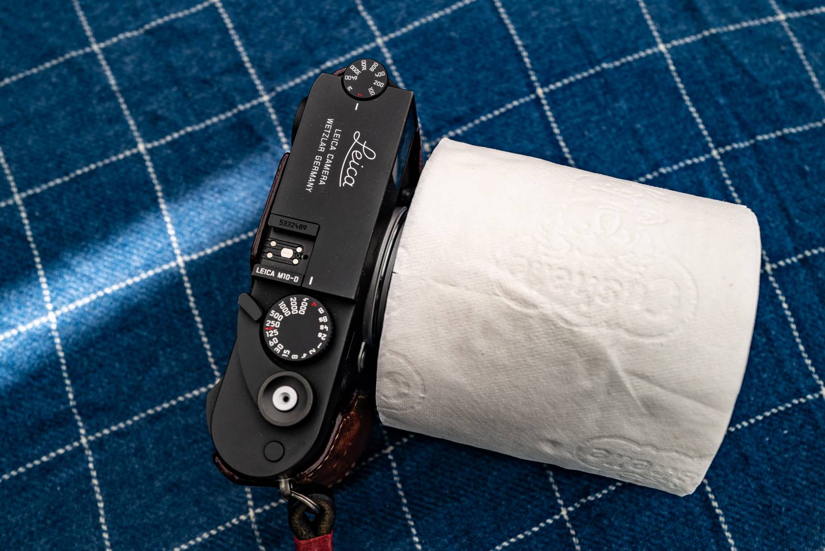 The new 75mm f/1.4 Leica Bummilux special edition in white, with cushioned filigree engraving on the barrel. Designed by Peter Krappe, this new edition to the Leica range costs £11,250. but is exempt from VAT because of its utilitarian pretensions.