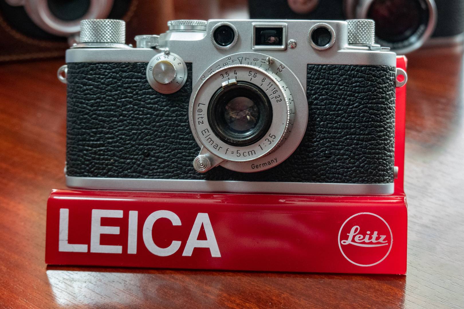 This Leica IIIf (red dial) is an excellent starter for your collection. And the 5cm f/3.5 Elmar is the archetypal standard lens. Every Leica collector has at least one of these and it won't cost you an arm and a leg.