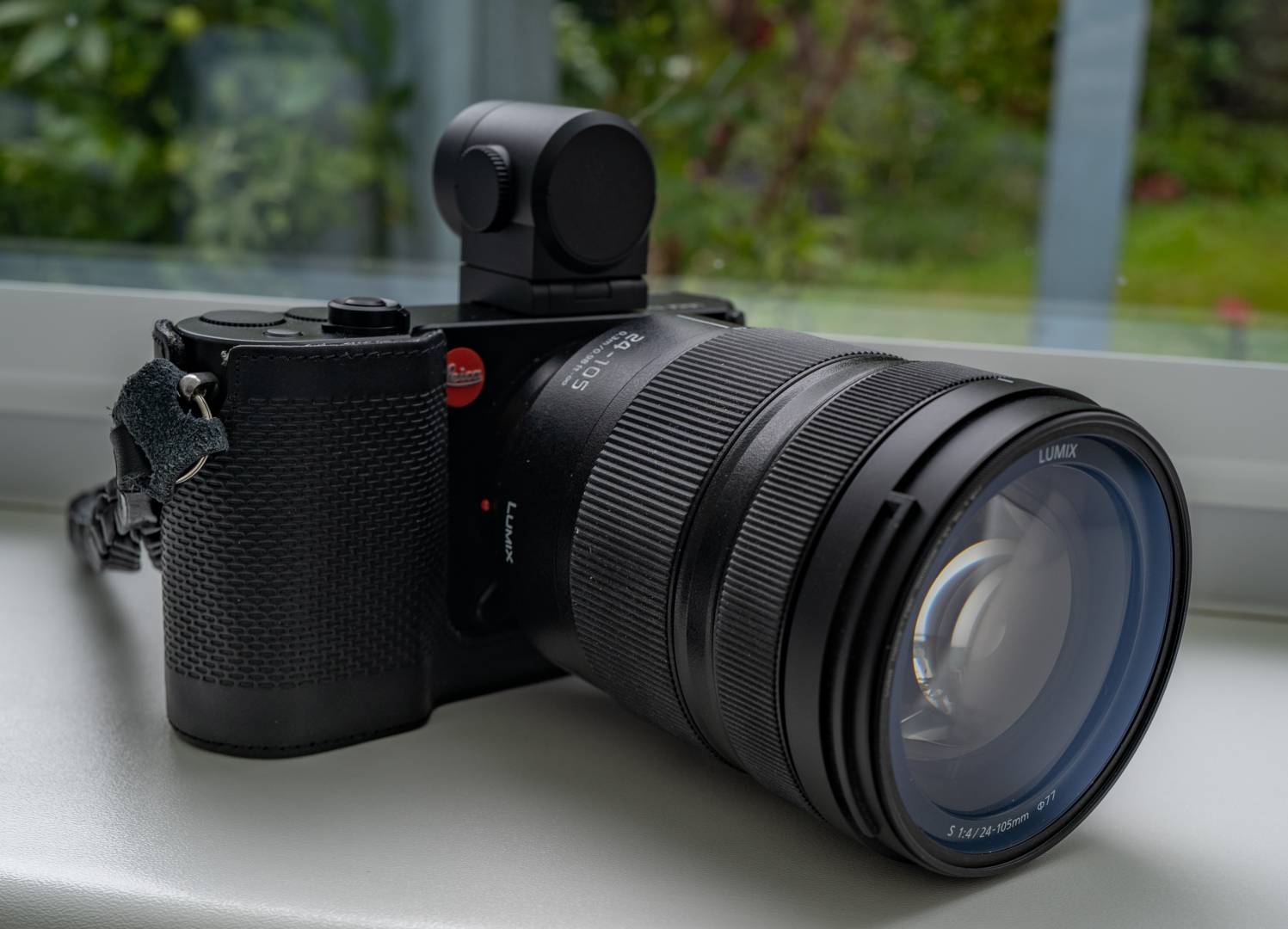 TL2 with the Visoflex veiewfinder and Leica leather protector. The lens is Sigma's 24-105 mm which equates to 36-158 on this camera. It's a versatile optic and includes image stabilisation, something which is entirely missing from Leica's APS-C system.