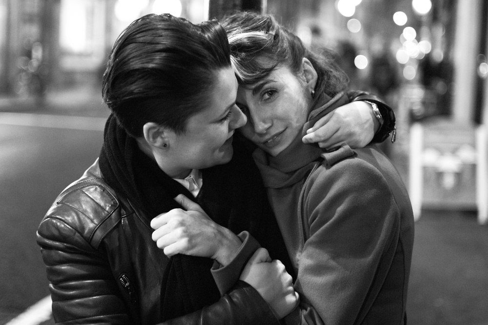 Night shot in Soho: Nichol and Lucy in Old Compton Street. Image Mike Evans, M9 Monochrome and 35mm Summilux FLE
