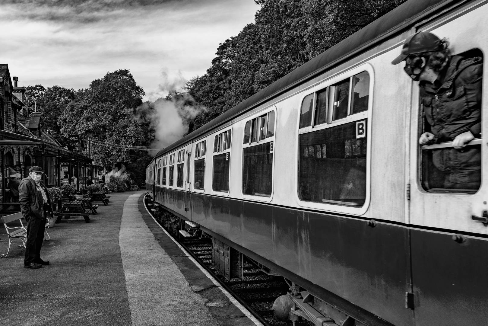 Guard guarded: Covid protection for the guard of the train arriving at Haverthwaite from Lakeside at the foot of Lake Windermere (Mike Evans)