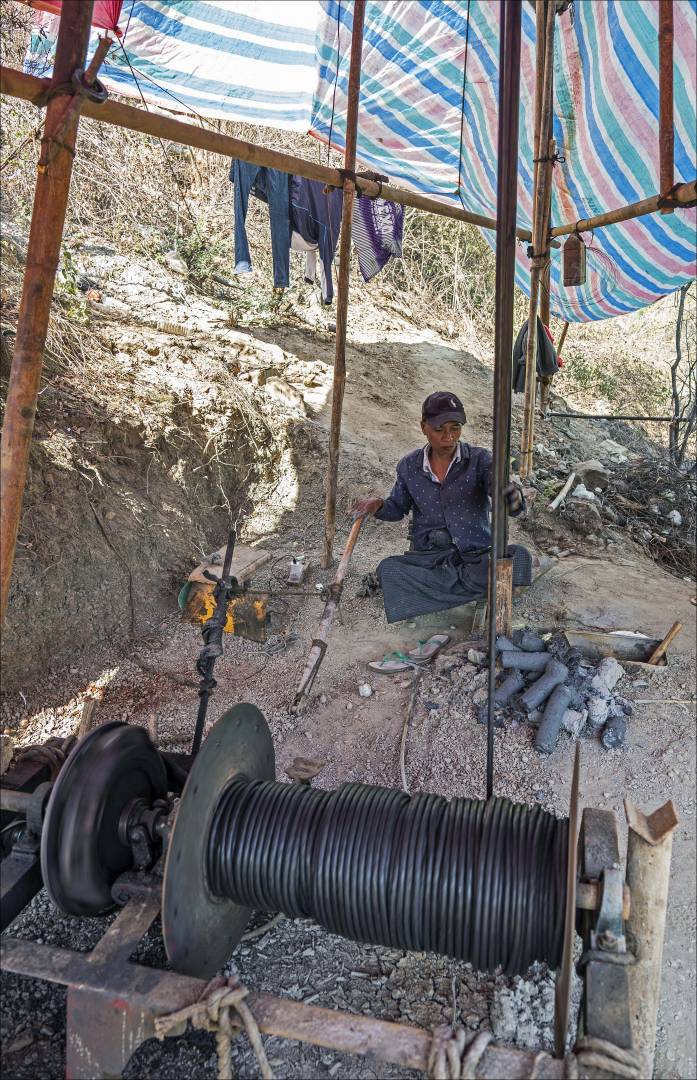 Drillling through a layer of mud, an operation which has been in steady decline since this photograph was taken