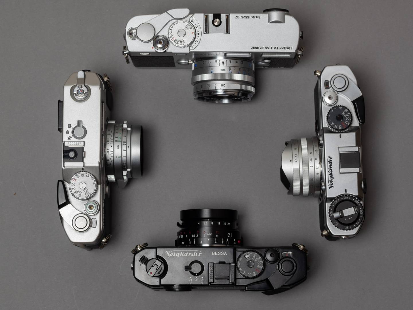 All made by Cosina: Zeiss Ikon (top), Voigtländer Bessa T (right), Voigtländer Bessa R4M (bottom), Rollei 35 RF (left)