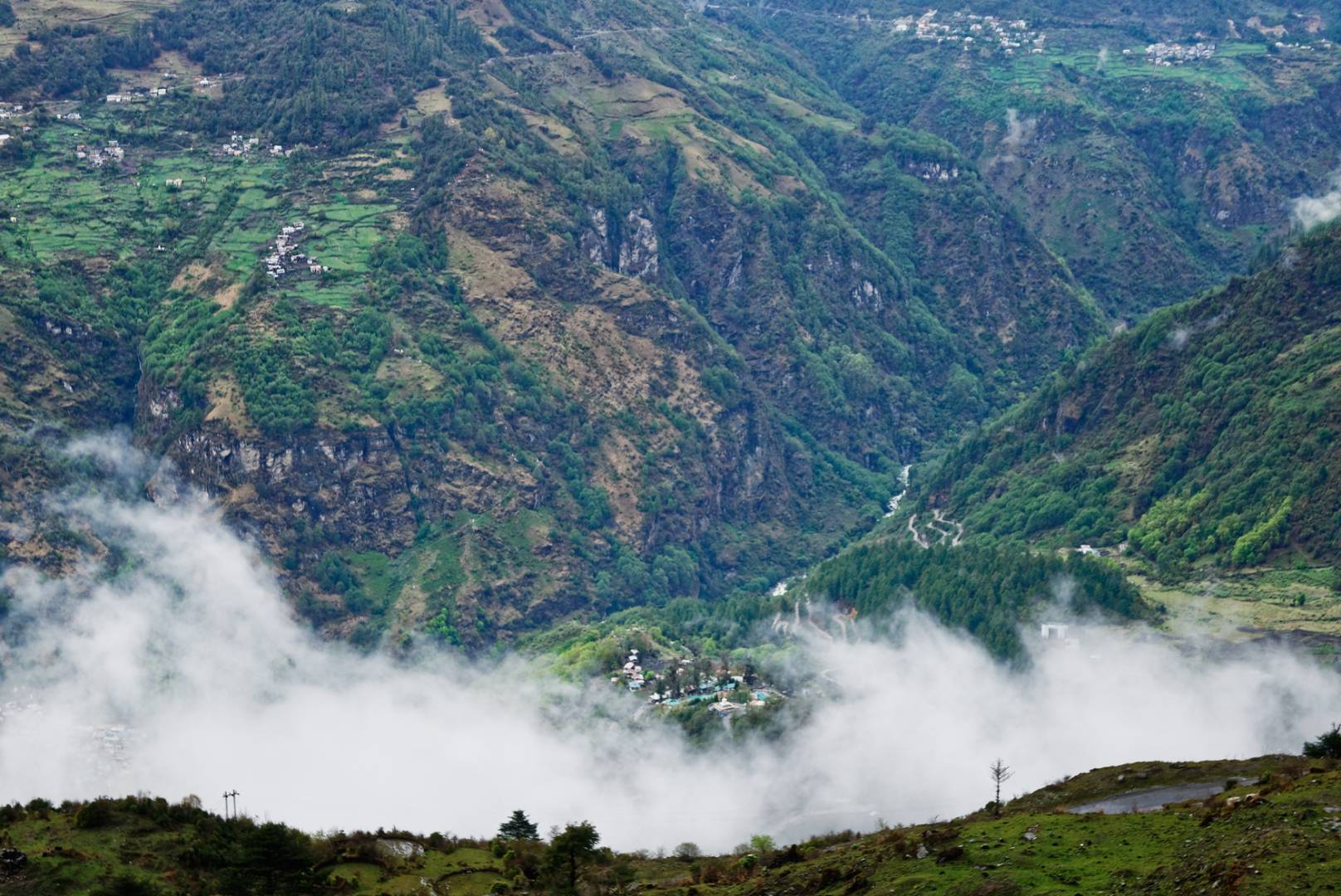 The village of Jung seen through a clearing in the clouds