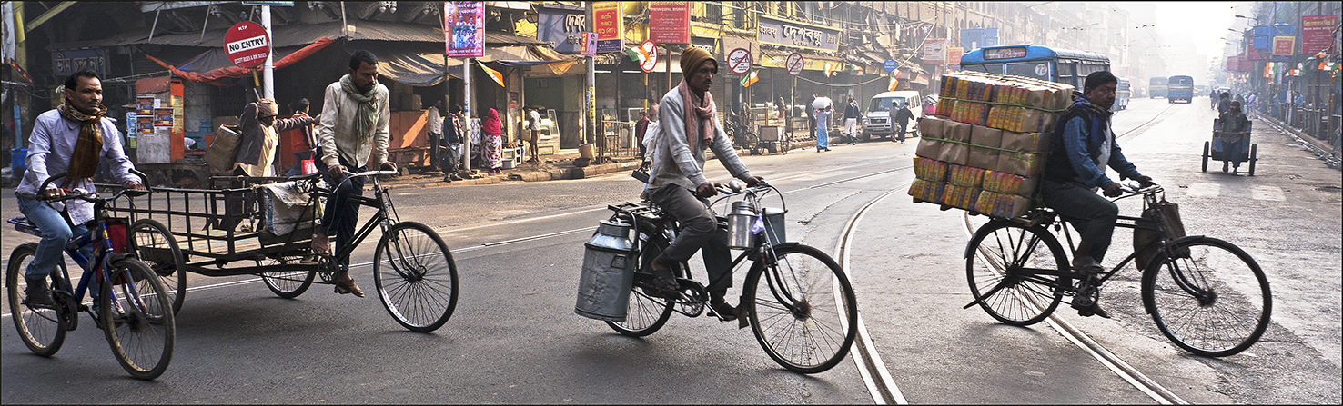 Bikes and Trikes Crossing MG Road