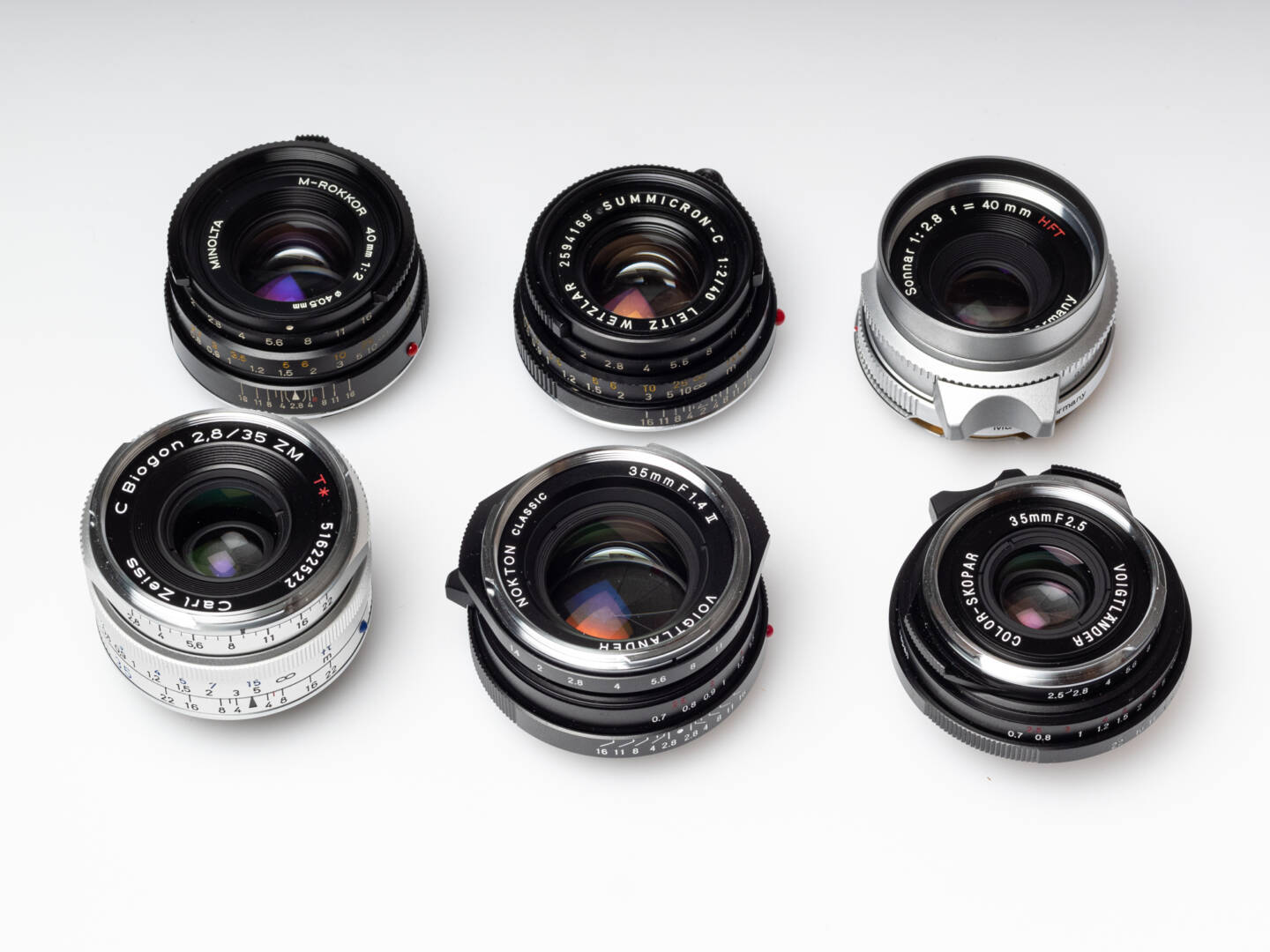 35 or 40 mms is an excellent focal length for rangefinder photography. I used (top, from left): Minolta M-Rokkor 40/2, Leitz Summicron-C 40/2; Rollei Sonnar 40/2.8 and (bottom) Zeiss C Biogon 35/2.8, Voigtländer Nokton Classic II 35/1.4, Voigtländer Color Skopar 35/2.5