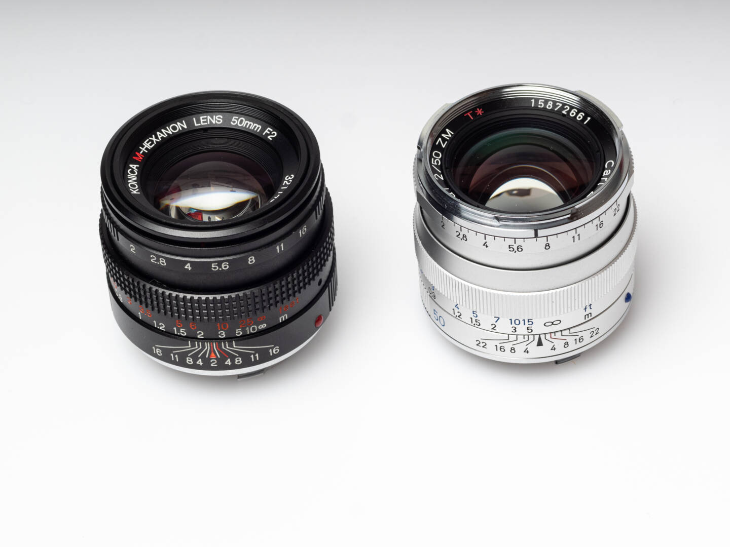 Two non-Leica standard lenses with M mount: Konica M-Hexanon 50/2 and Zeiss Planar 50/2