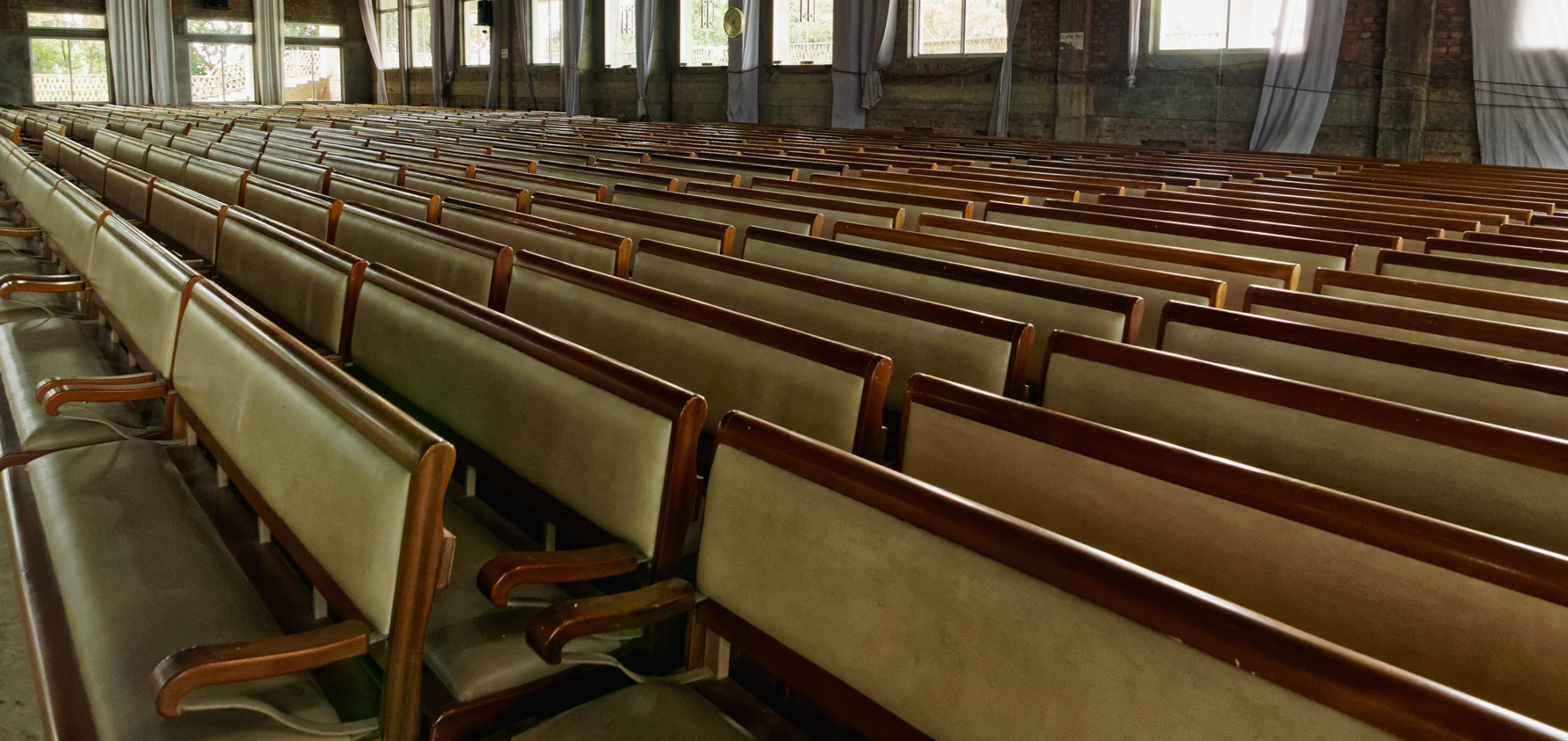 Pews inside the main hall that can accommodate up to 2,000 people