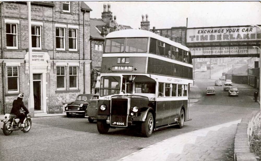 Where it all started, in Scholes, a street in Wigan. To the far right, under the bridge, is Foster's Motorcycles where the Honda Benly Super Sports was purchased in late 1960. The bike on the left, coincidentally, is a 250 cc Honda Dream, probably also supplied by Fosters. Picture courtesy of WiganWorld.co.uk
