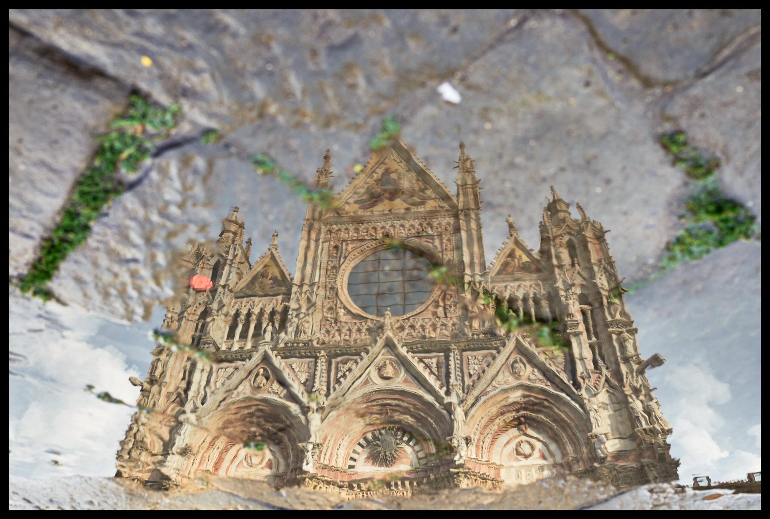 The Cathedral of Siena upside down after the rain [Leica Q]