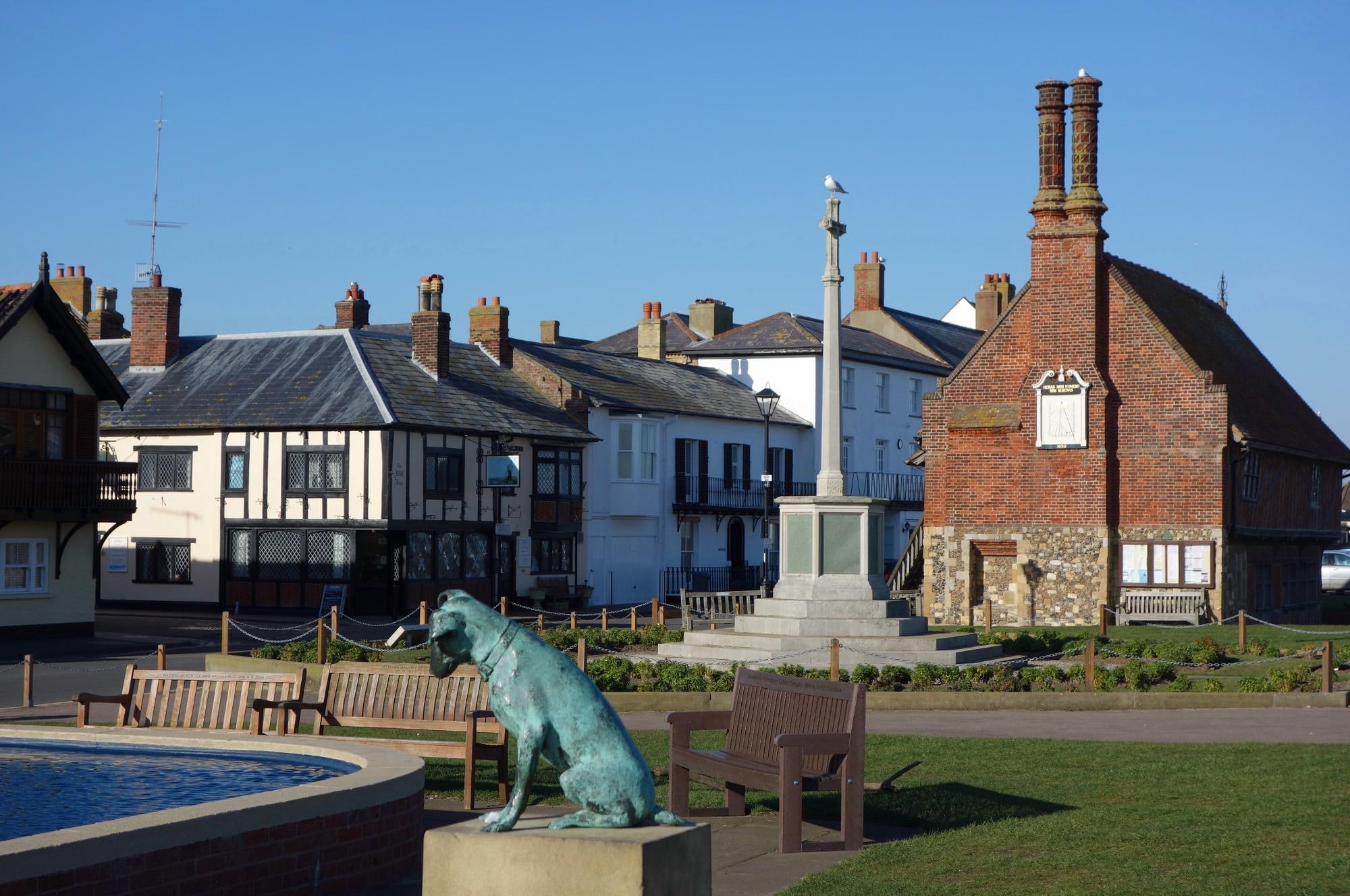 Snooks the dog, the Tudor Moot Hall, the war memorial, the pub and model yacht pond in the centre of Aldeburgh