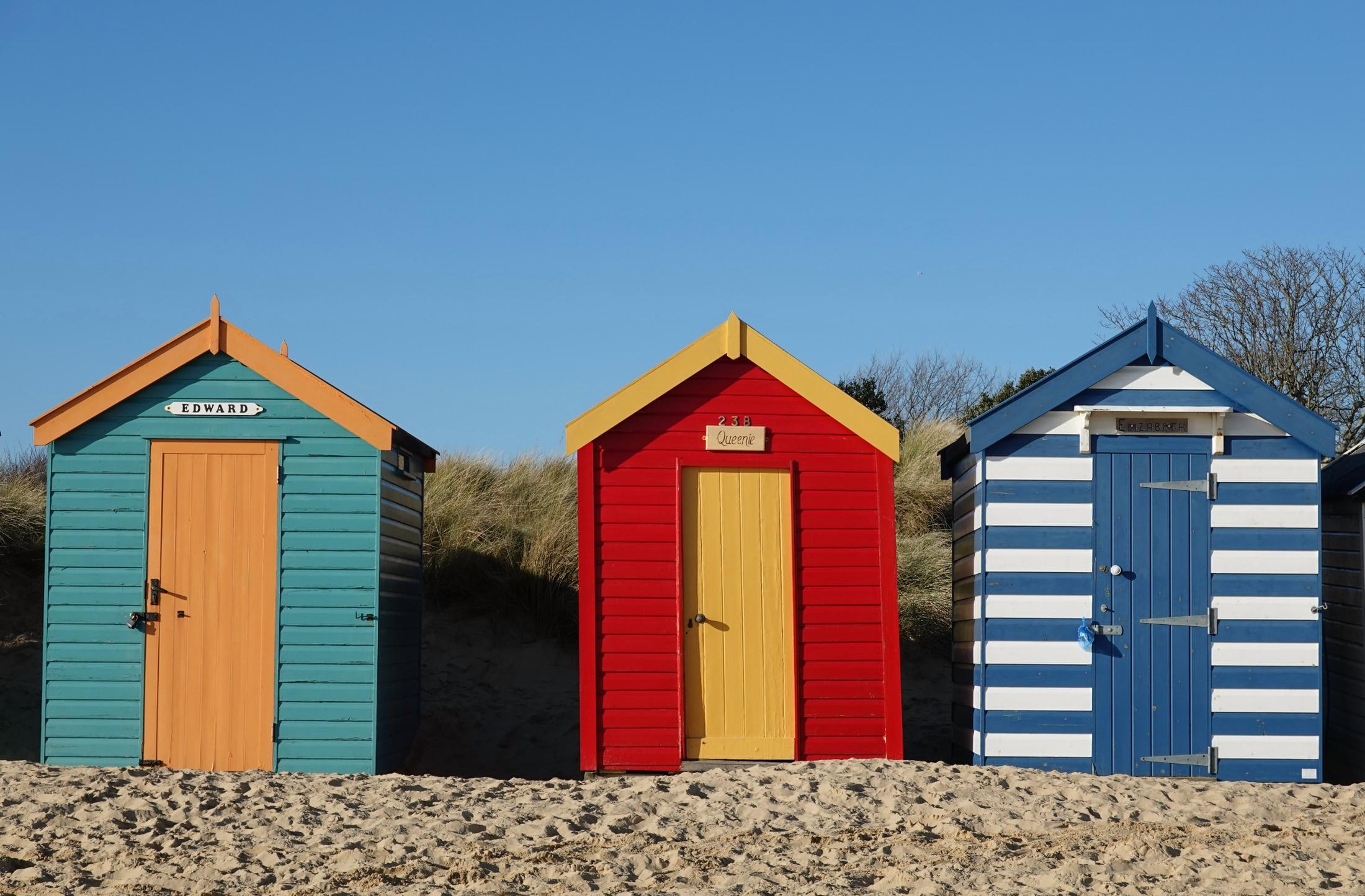 Beach huts in front of the sand dunes at the southern part of the beach in mid-January