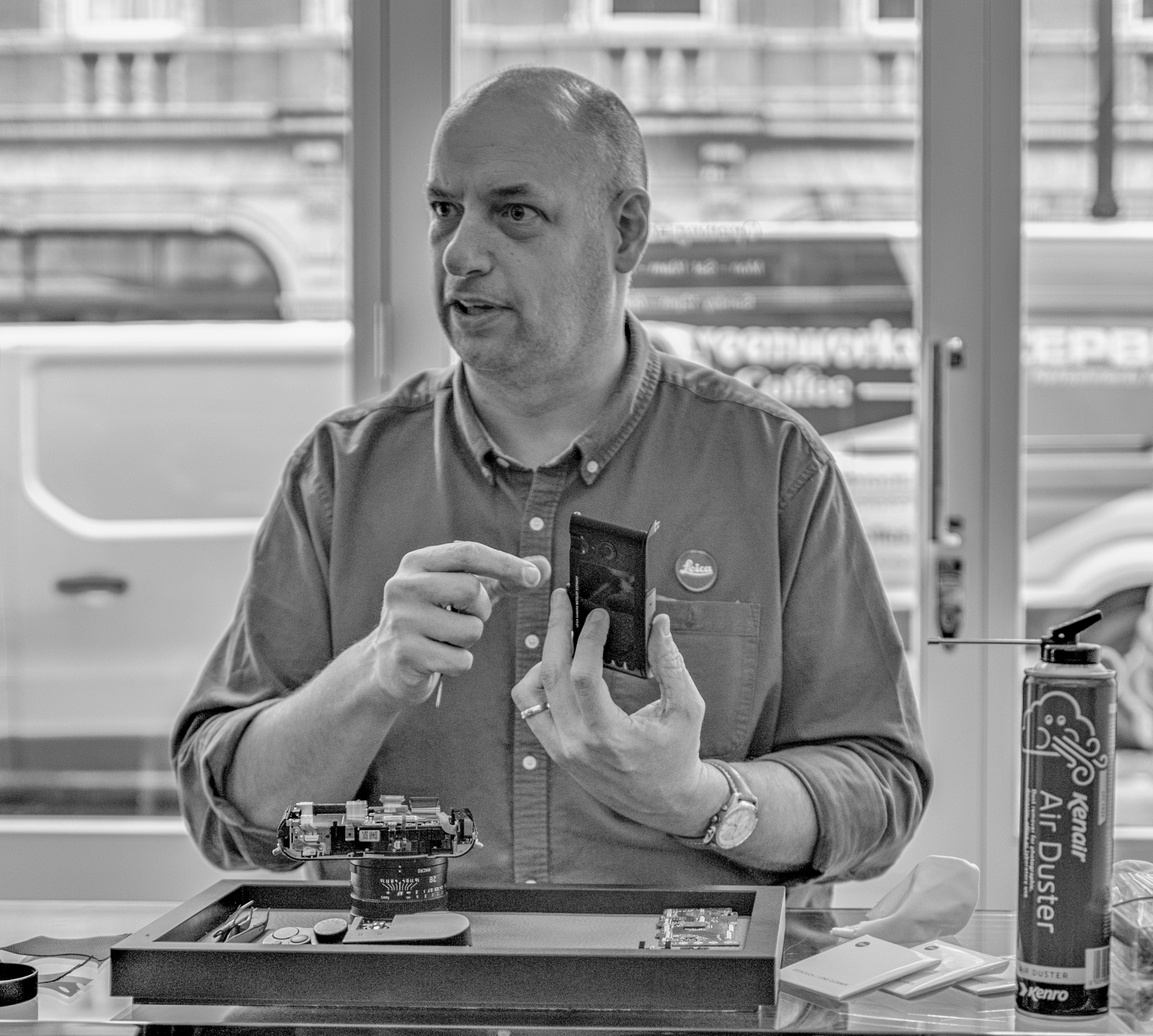 David Slater demonstrating how to strip down a Leica Q at a Leica Society gathering in Mayfair in October 2019