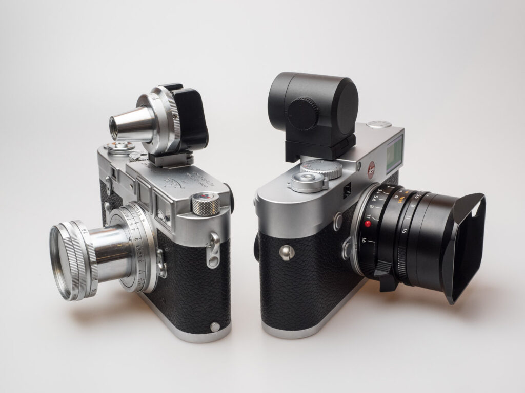 Product image shows two of the attachable viewfinders made by Leica