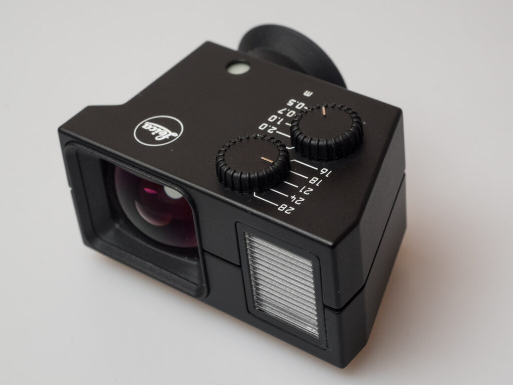 Product image shows one of the attachable viewfinders made by Leica