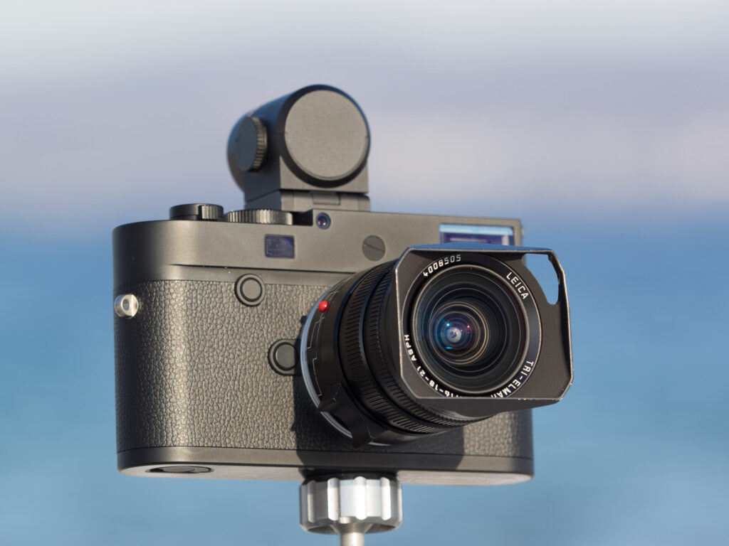 Product image shows one of the attachable viewfinders made by Leica mounted on a Leica rangefinder camera