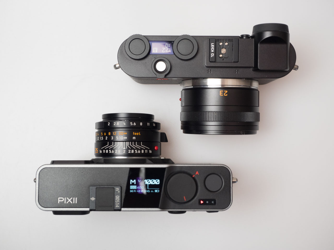 Product image shows Pixii rangefinder camera model A2572 with Leica CL digital