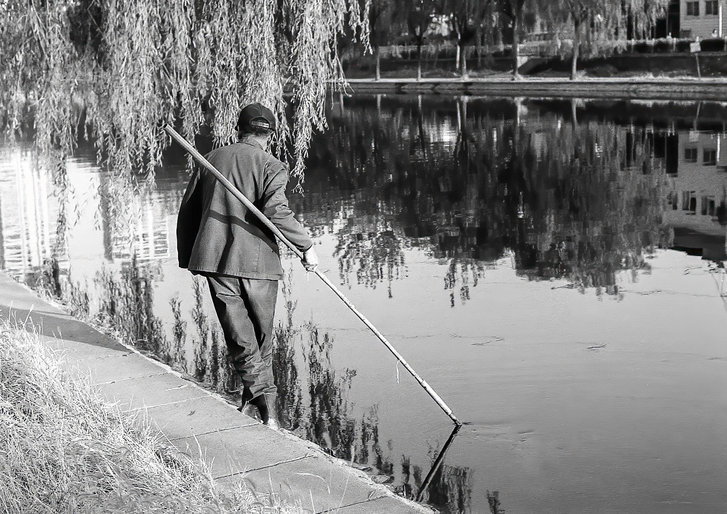 Fishing for dinner, Beijing canal