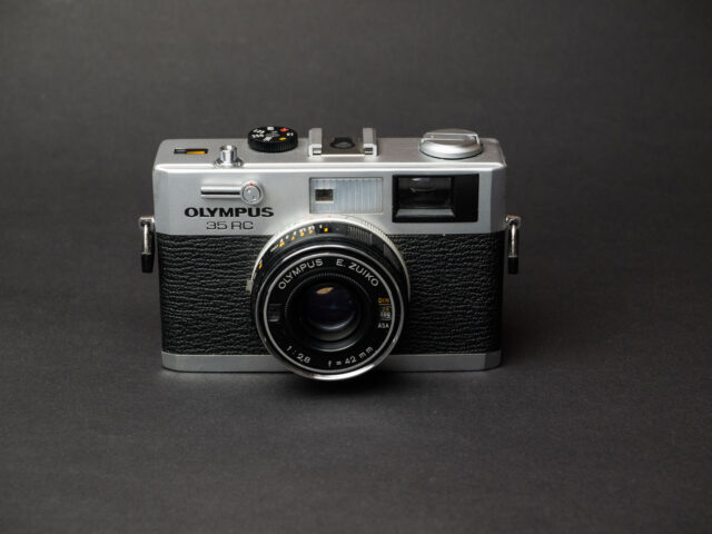 OLYMPUS DIGITAL CAMERA Product image shows the Olympus 35 RC analogue rangefinder camera