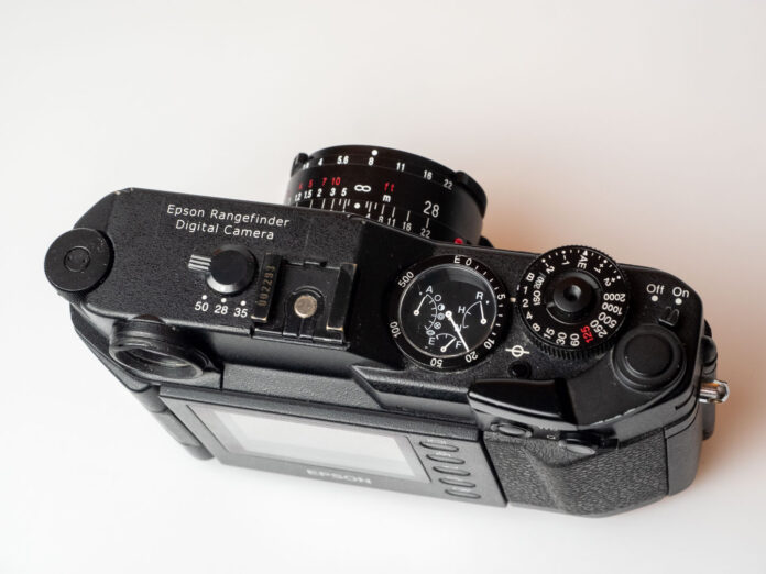 OLYMPUS DIGITAL CAMERA Product image shows Epson R-D1 digital rangefinder camera