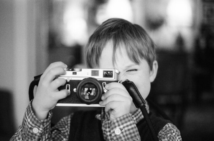 Boy holding Leica M4