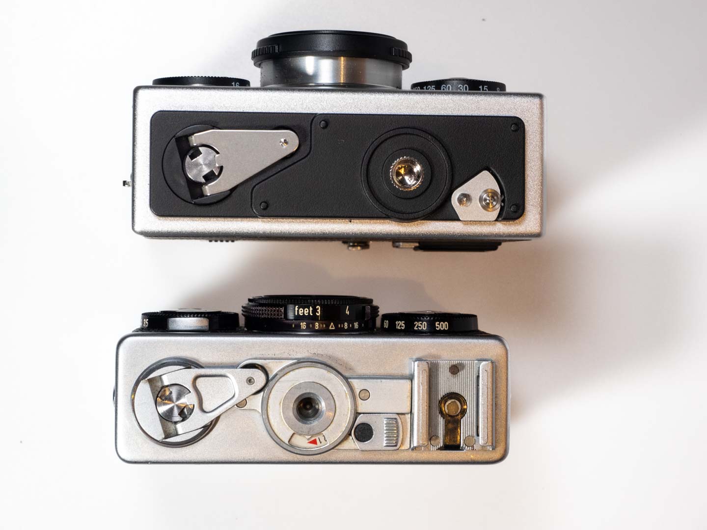 Product image shows Rollei 35AF analogue camera (2024) and its predecessor, the Rollei 35 which was first launched in 1966.