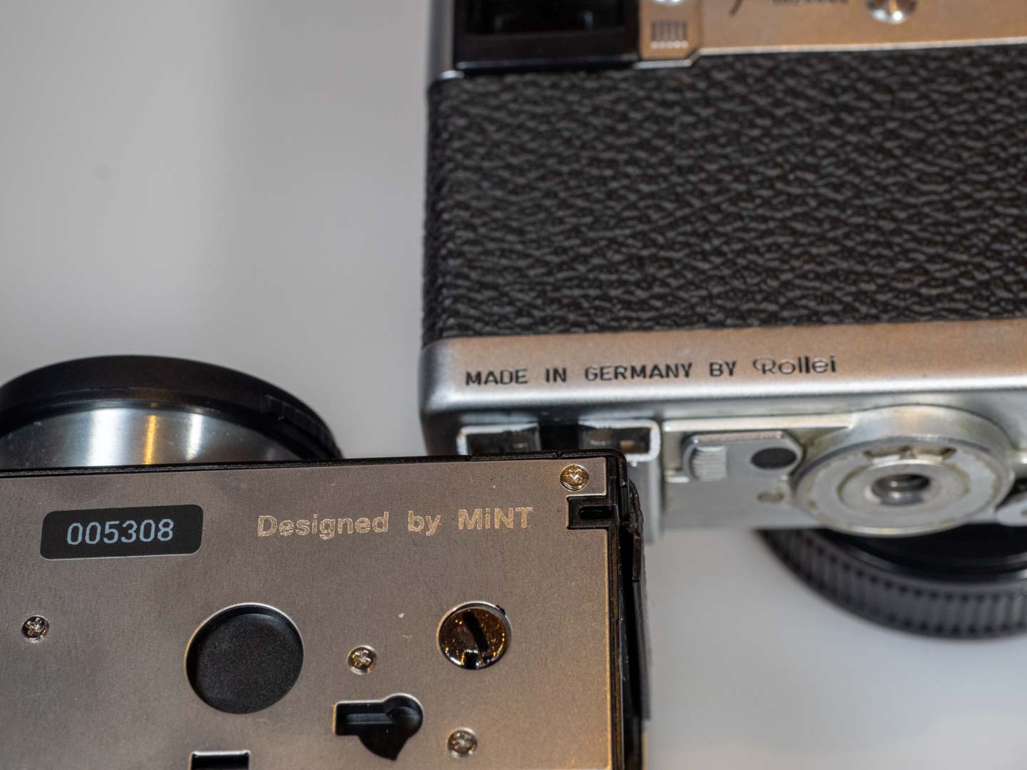 Product image shows Rollei 35AF analogue camera (2024) and its predecessor, the Rollei 35 which was first launched in 1966.