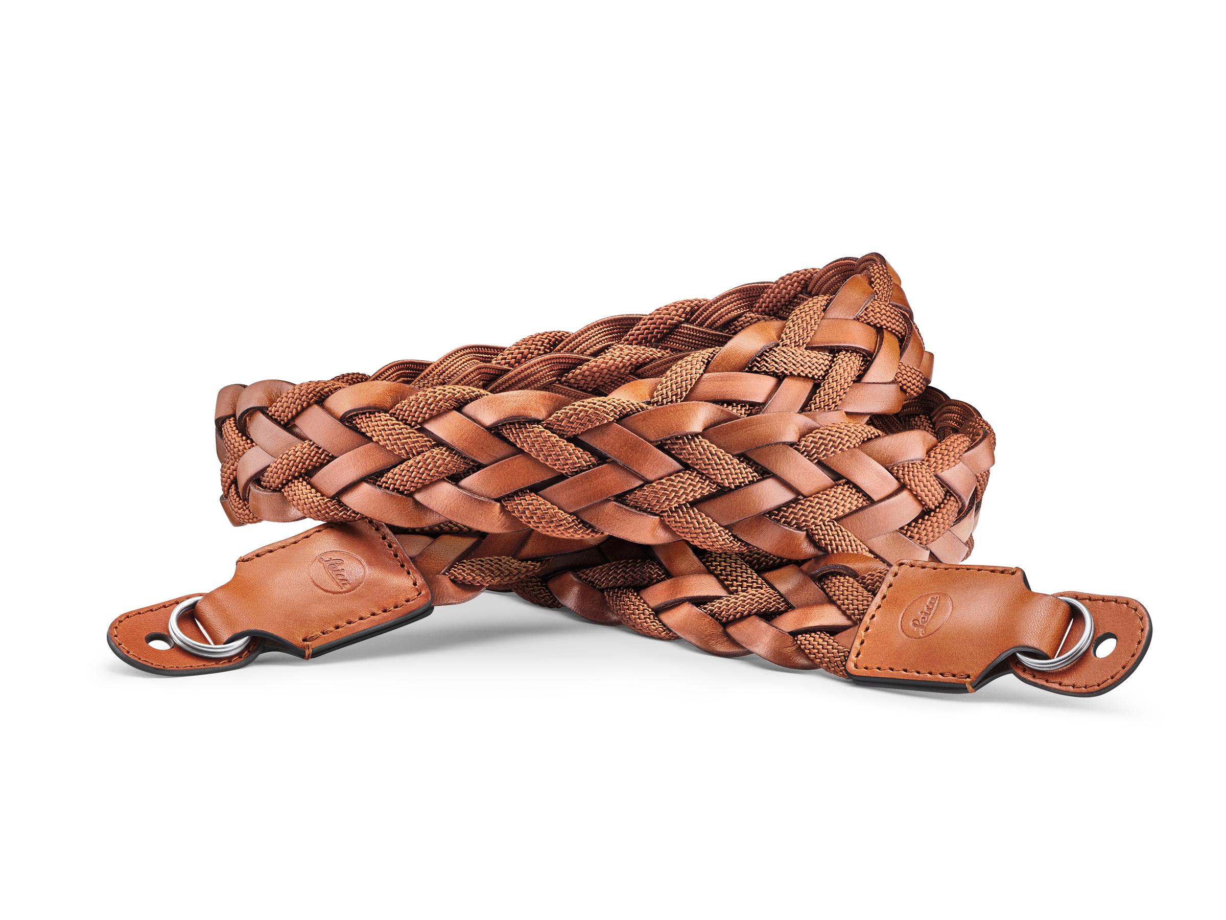 A woven leather carrying strap in a rich tan color, featuring metal clasps for attachment.