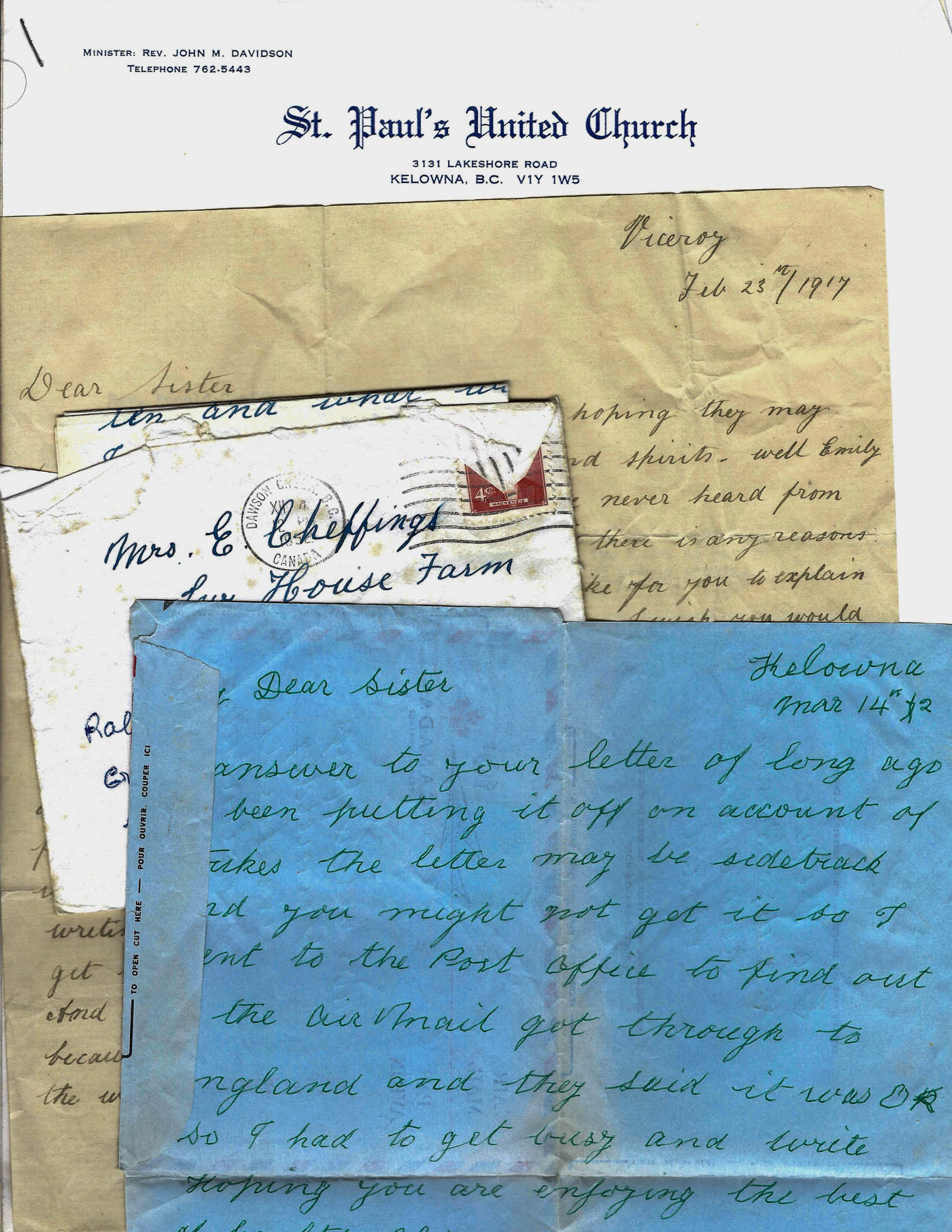 A collection of old letters and envelopes addressed to family members, featuring the letterhead of St. Paul's United Church in Kelowna, British Columbia, along with handwritten correspondence in blue ink.