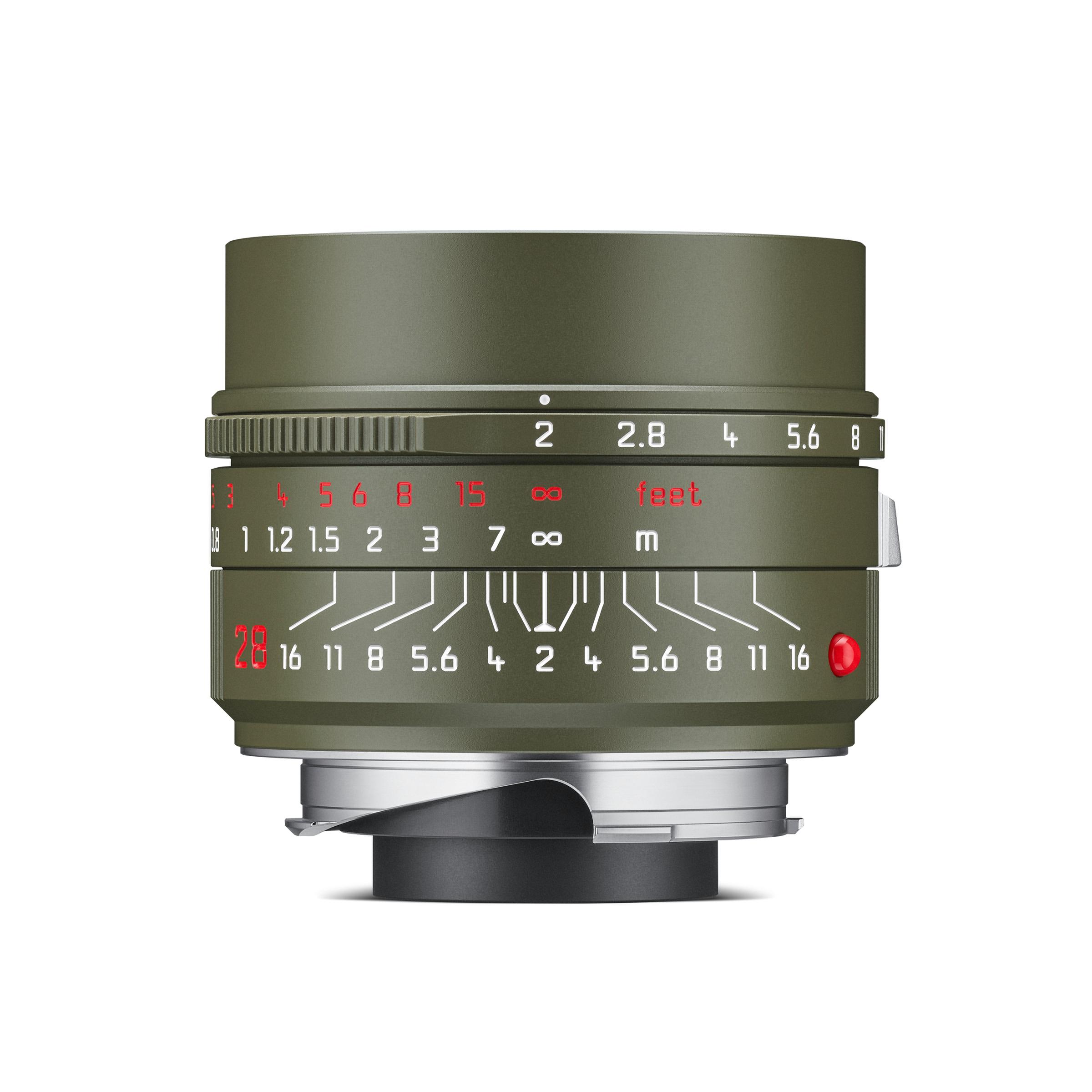 Leica Summilux-M 28mm f/1.4 ASPH Safari lens featuring a matte olive green finish, red feet, and white meter scales.